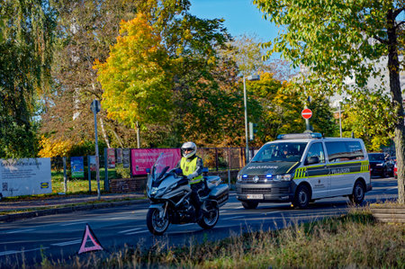 Berlin, Germany - November 04, 2023: Autumnal street scene in Berlin with vehicles of the military police of the Bundeswehr.のeditorial素材
