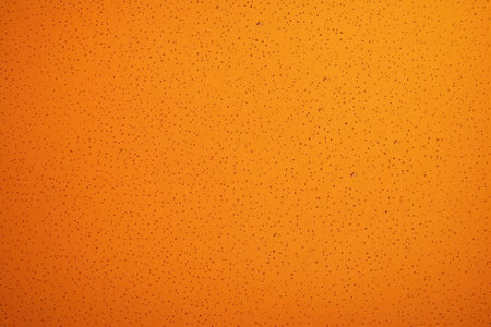 abstract orange background with small holes, can be used as backgroundの素材