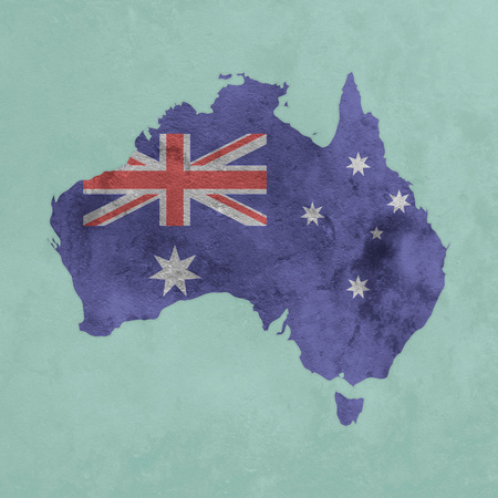Illustration of a textured map of Australia with flagの写真素材