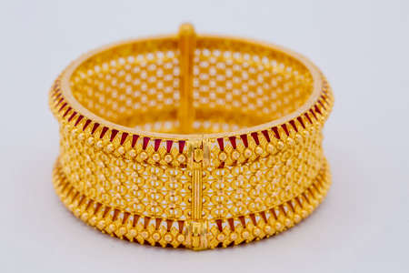 Indian beautiful gold jewellery. Jewellery background on white.