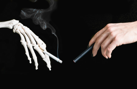 E-Cigarette vs cigarette conceptの写真素材