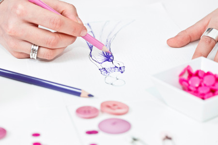 Fashion designer sketching purple prom dressの写真素材