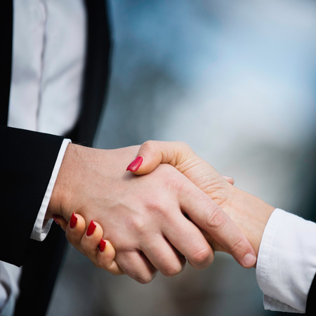 Handshake - classic business symbol, close-upの写真素材