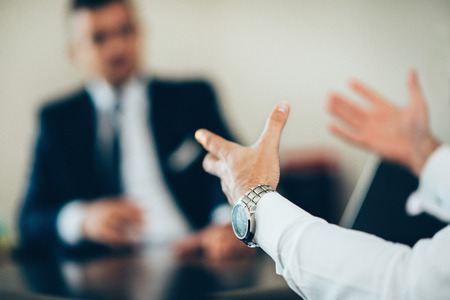 Detail from the business meeting, managers discussing important mattersの写真素材