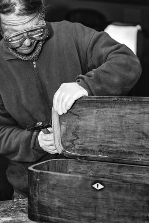 Furniture restaurator workingの写真素材