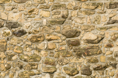 Large old brick wall on the fortress, convenient as backgroundの写真素材