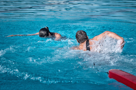Lifeguard swimming towards the victimの写真素材