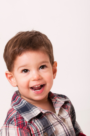 Portrait of cute smiling 2 year old boyの写真素材