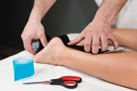 Taping in physical therapyの写真素材