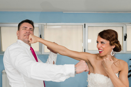 Bride hitting groomの写真素材