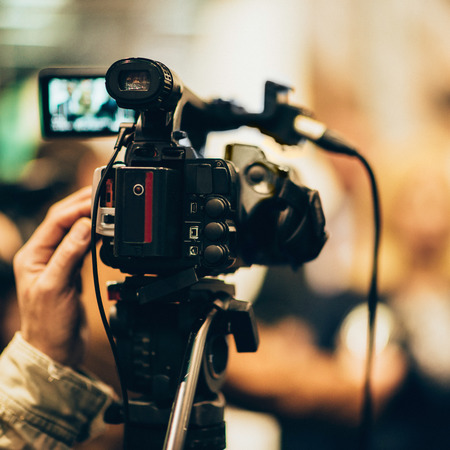 Television camera at press conferenceの写真素材
