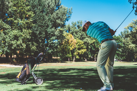 Golfer swingsの写真素材