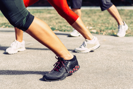 Focus on legs on tae bo training outdoorsの写真素材