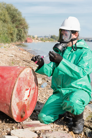 Environmentalist working on a chemical pollution siteの写真素材