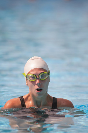 Tired swimmer in the waterの写真素材