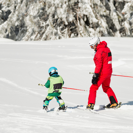 Little boy learning how to skiの写真素材