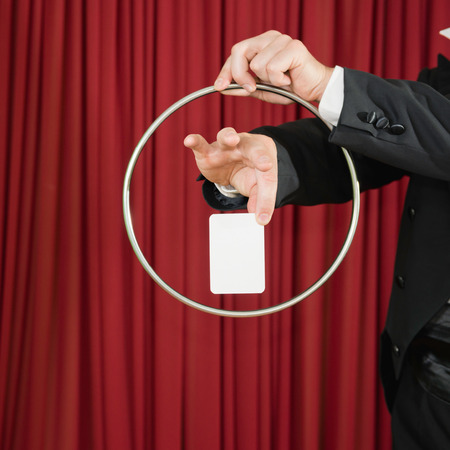 Magic trick with ring and blank card, convenient for your contentの写真素材