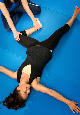 Physical therapy - opening stiff hipsの写真素材