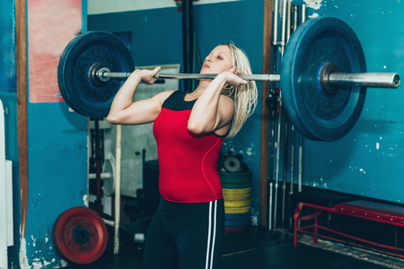 Female on weightlifting trainingの写真素材