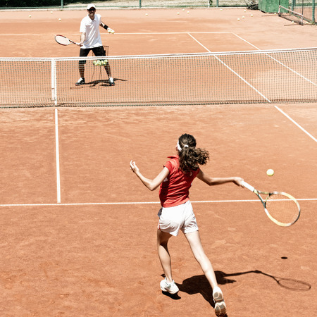 Tennis class with coachの写真素材