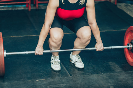 Female on weightlifting trainingの写真素材
