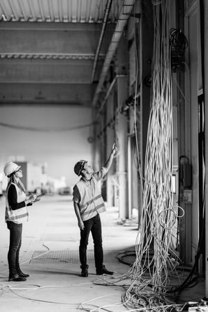 Maintenance Engineers checking electricityの写真素材