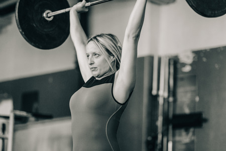 Female on weightlifting trainingの写真素材