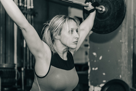 Female on weightlifting trainingの写真素材