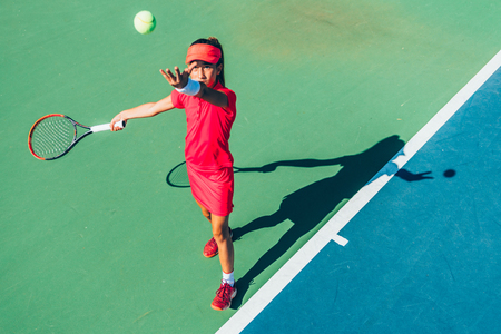 Girl playing tennisの写真素材