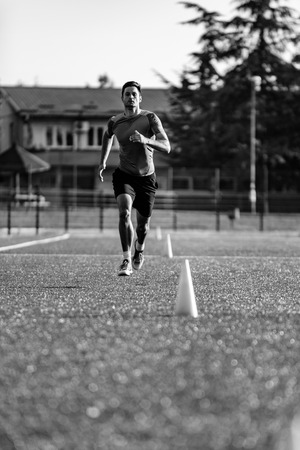 Male running on cross competitionの写真素材