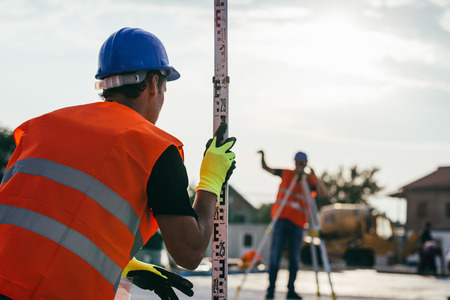 Surveyors on construction siteの写真素材