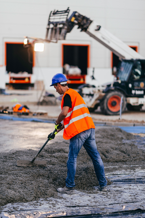 Manual Worker leveling concreteの写真素材