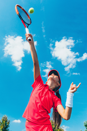 Girl on tennis trainingの写真素材
