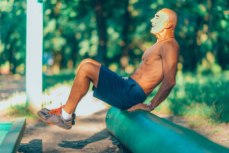 Senior man exercising outdoorsの写真素材