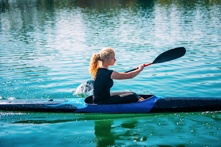 Female athlete in kayak