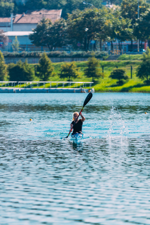 Female athlete in kayakの写真素材