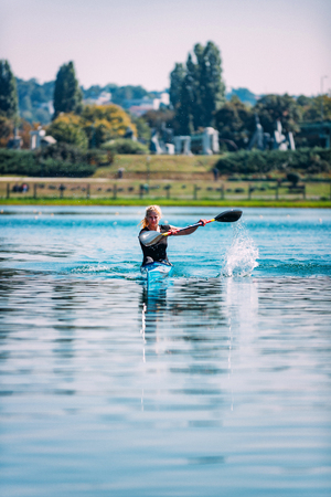 Female athlete in kayakの写真素材