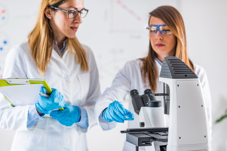 Biotechnology. Female scientists working in laboratoryの写真素材