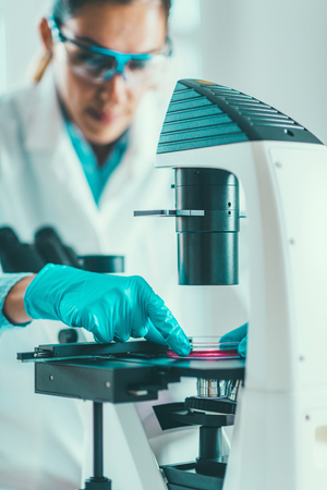 Biotechnology. Female scientist working in laboratoryの写真素材
