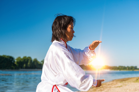 Tai Chi on lakeの写真素材