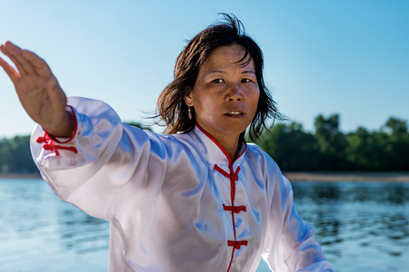 Tai Chi on lakeの写真素材