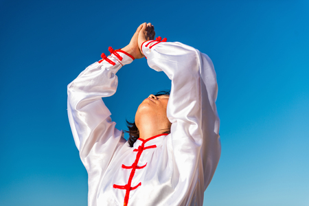 Chinese woman doing Tai Chiの写真素材