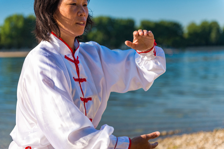 Tai Chi on lakeの写真素材