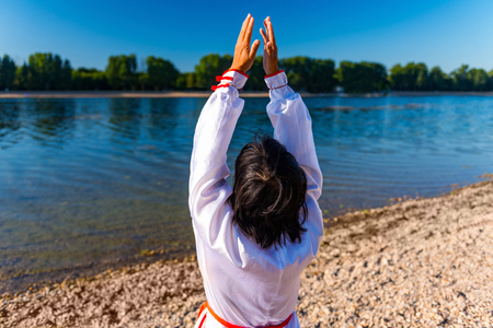 Tai Chi on lakeの写真素材