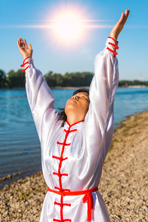 Tai Chi on lakeの写真素材