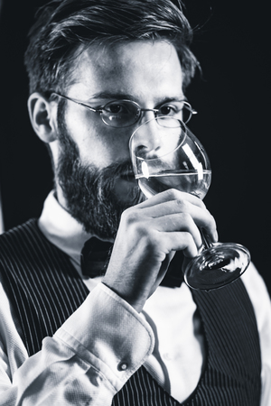 Sommelier tasting white wineの写真素材