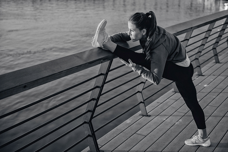 Streching on river sideの写真素材