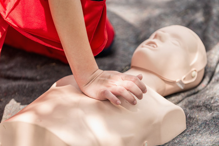 Cpr training outdoors. Reanimation procedure on CPR dollの写真素材
