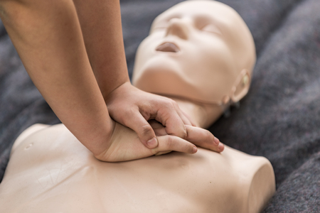 Cpr training outdoors. Reanimation procedure on CPR dollの写真素材