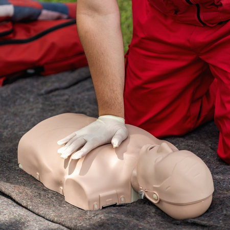 Cpr training outdoors. Reanimation procedure on CPR dollの写真素材